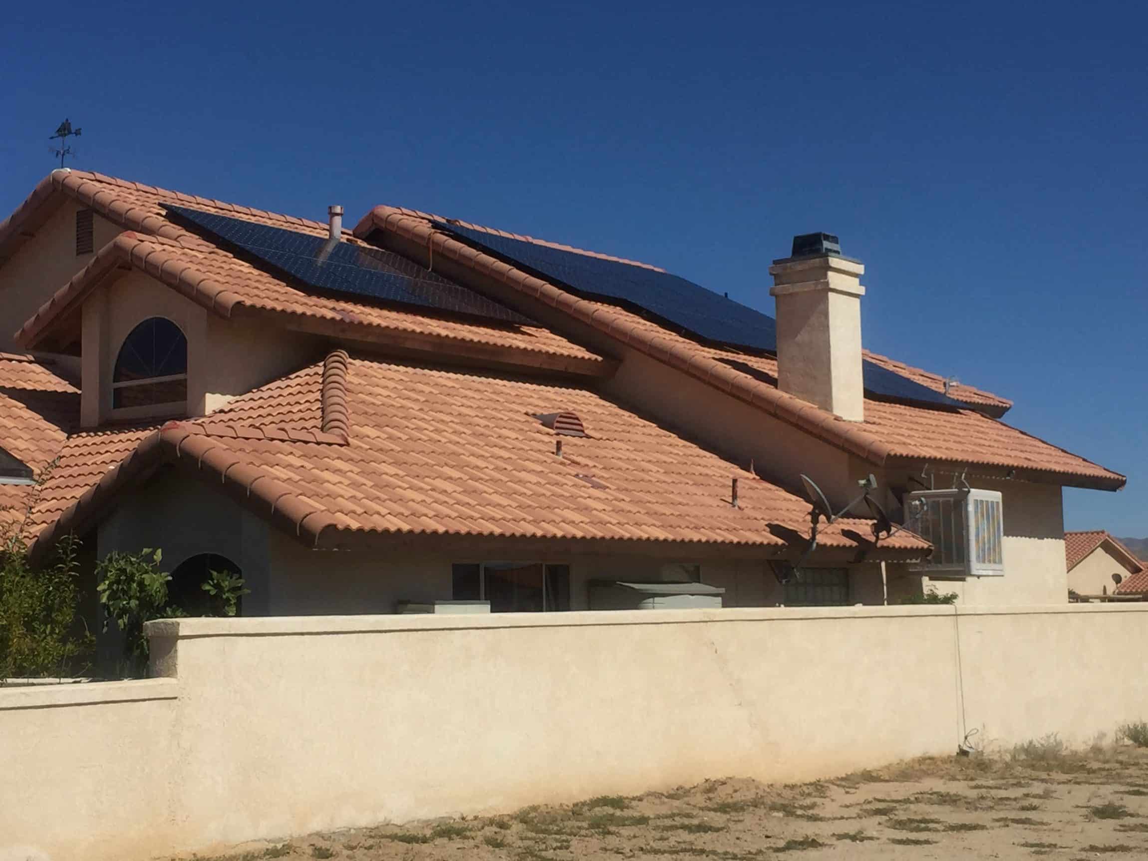 Exterior View of home with Solar Panels Installed on Roof