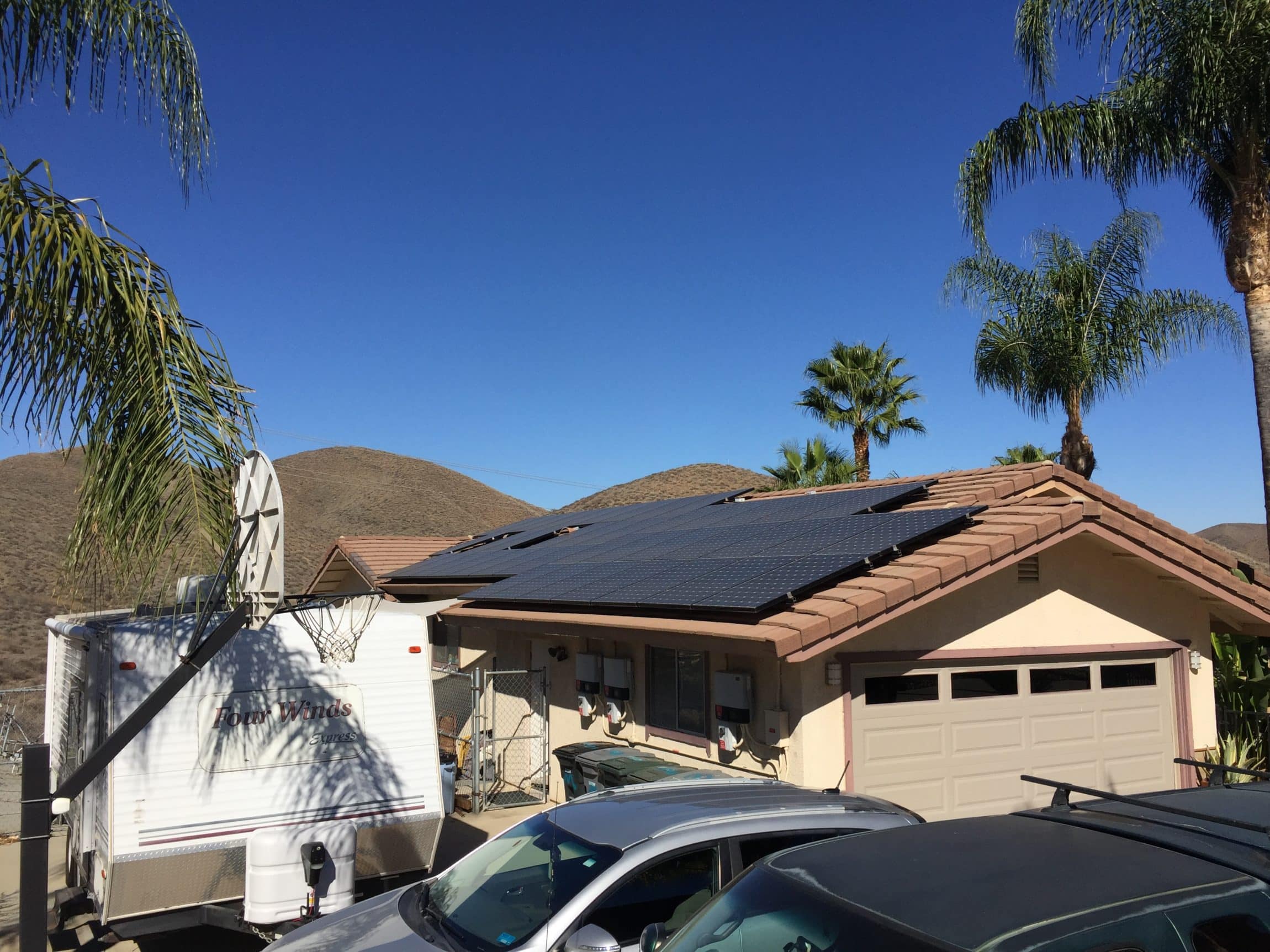 Exterior View of home with Solar Panels Installed on Roof