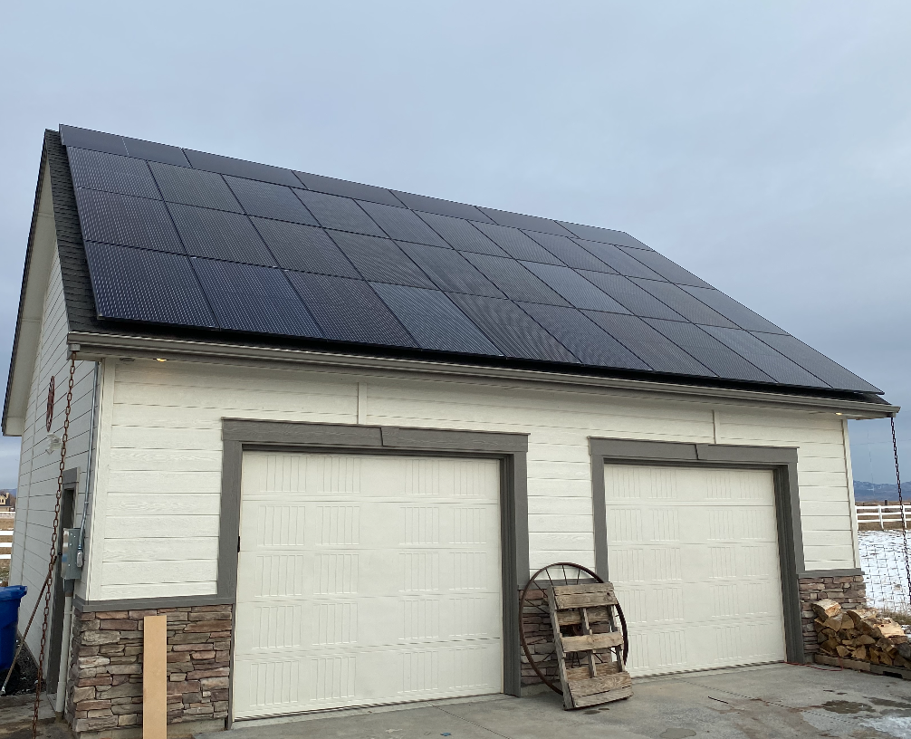 Exterior view of a home with solar pannels installed by Pell Solar